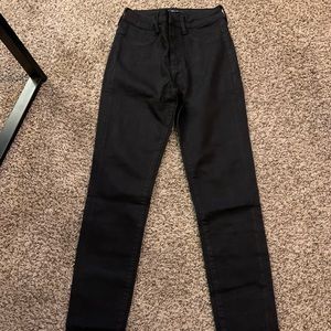 Black high-waisted skinny jeans